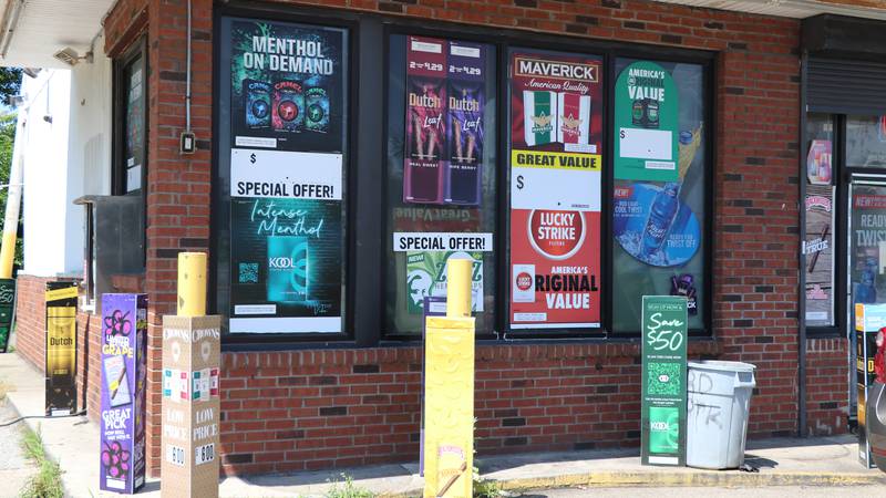 Tobacco ads cover the exterior of a convenience store in Cleveland.